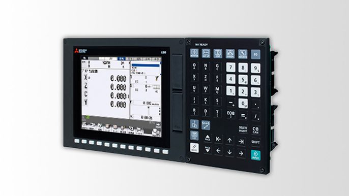 Console di un controllo numerico Mitsubishi con schermo delle quote e tastiera integrata